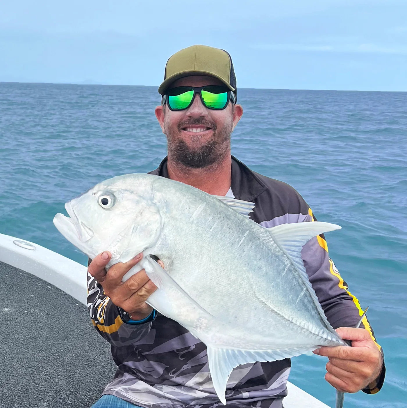 Carbon - Matte Black Frame - Green Iridium Polarized Mineral Glass Lens