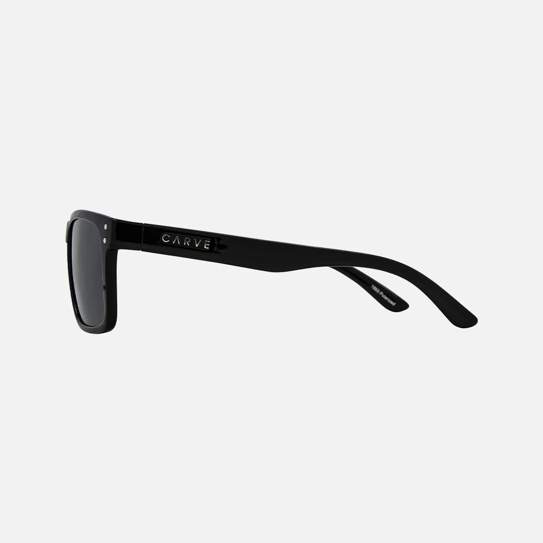 Black sunglasses with 'Carve' branding on a white background