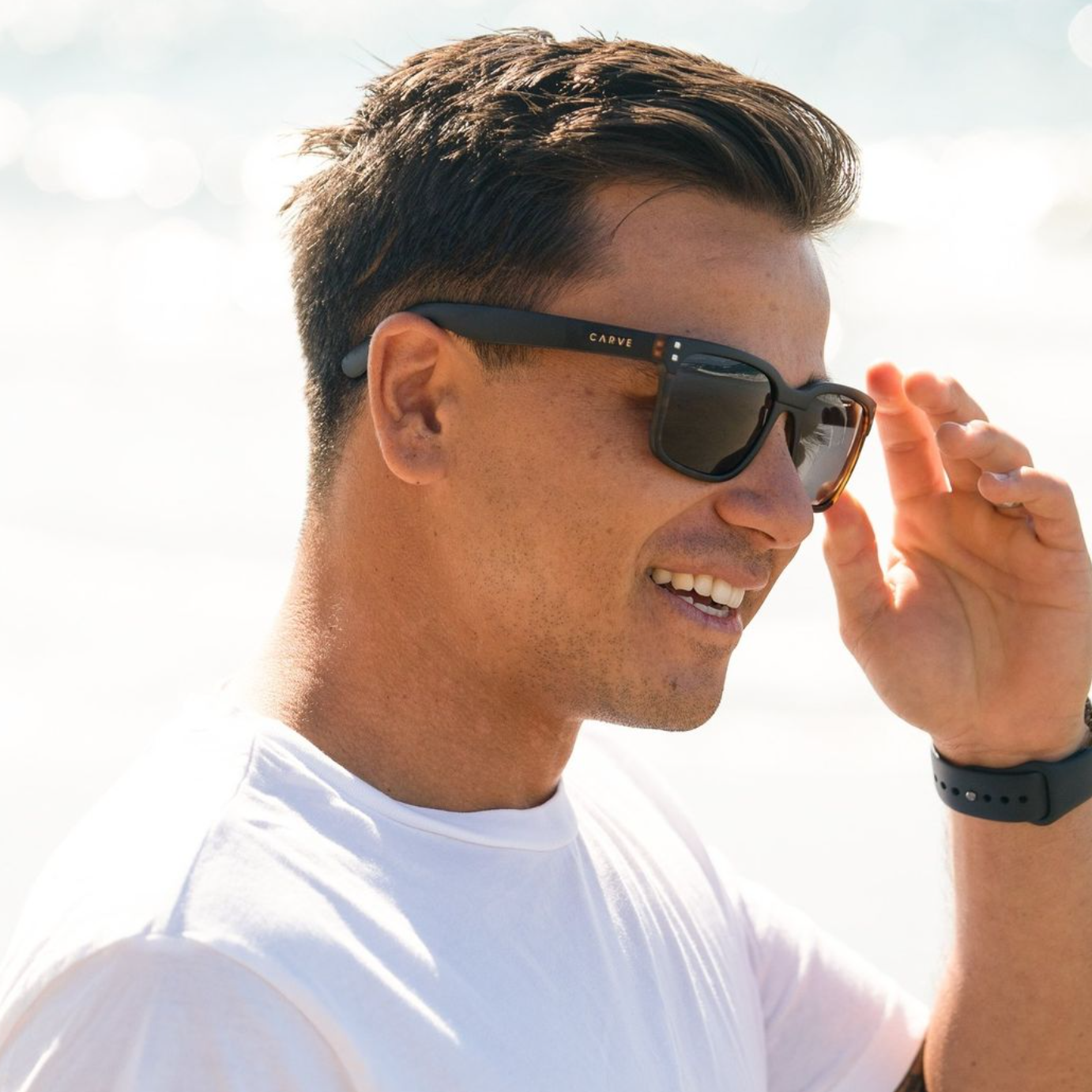 Man wearing sunglasses with a white background