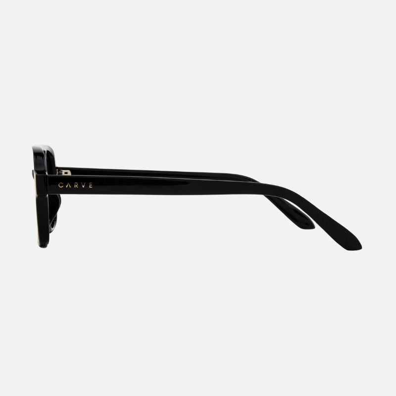 Black sunglasses with 'Carve' branding on a white background